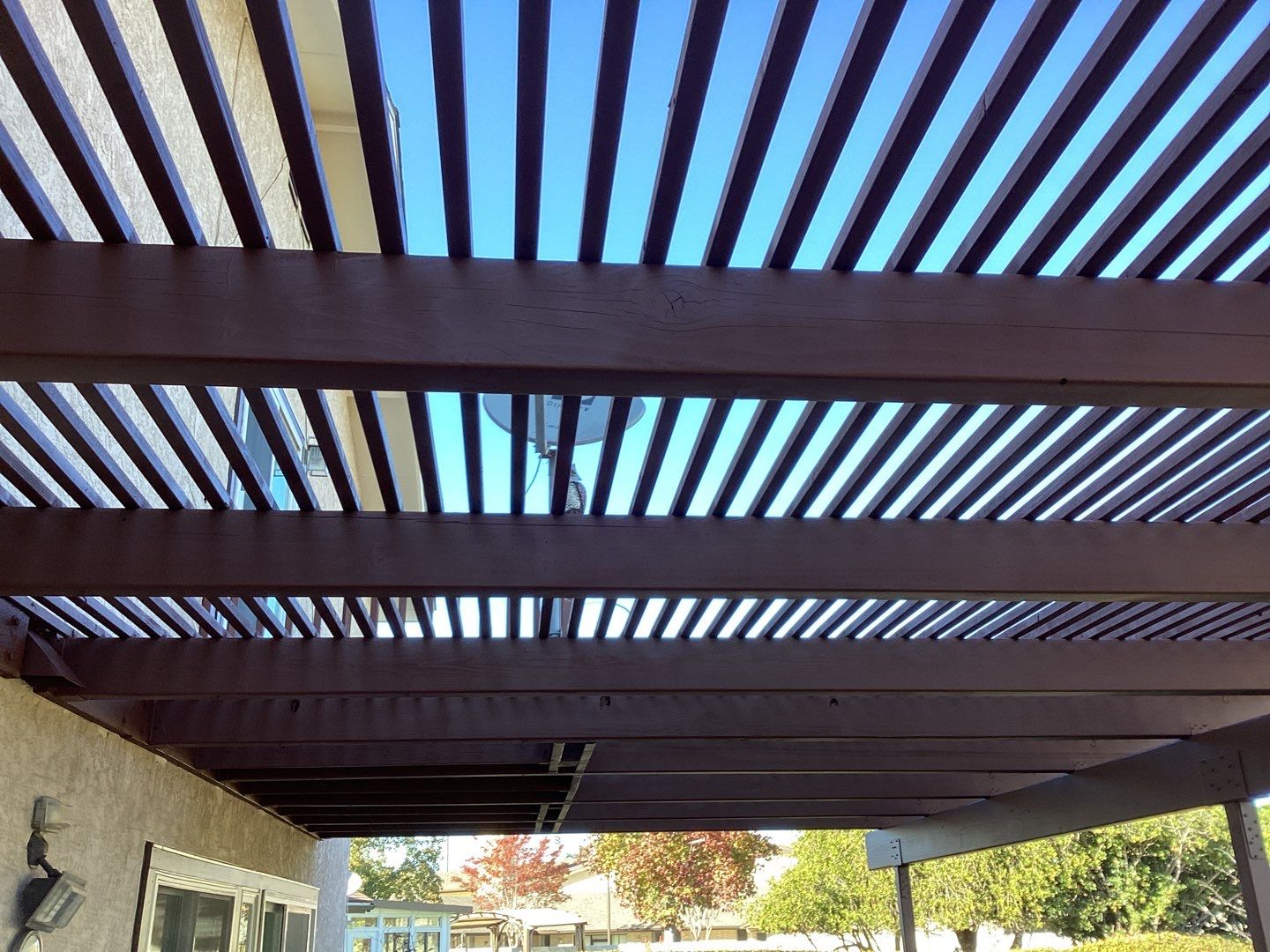 A Wooden Structure Painted Pergola